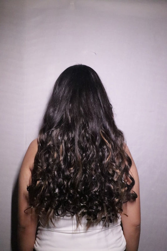 Highlighted curly volumizer hair extensions for women